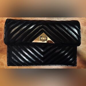 Black Chevron Quilted Crossbody with gold chain. NWT